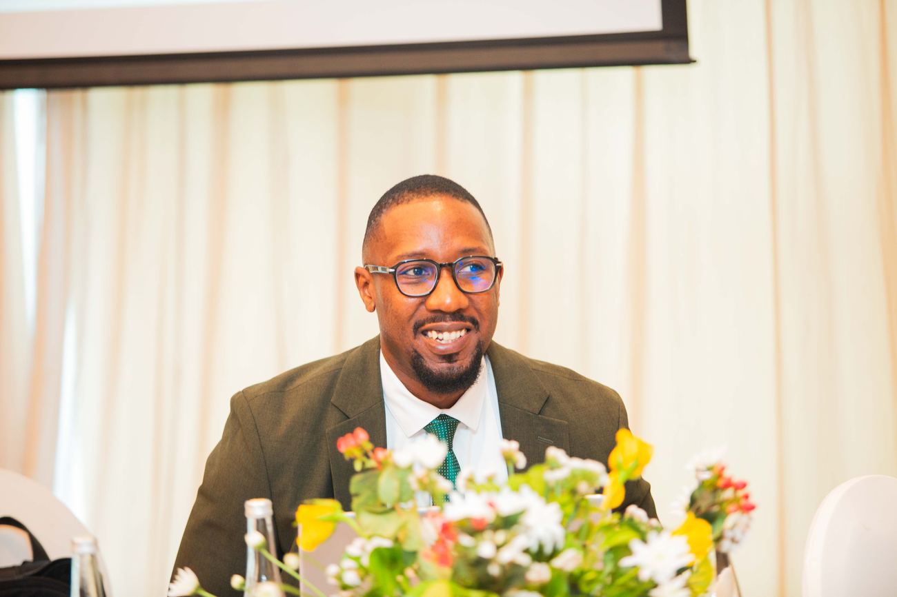 Junior Msangi speaking at a business forum